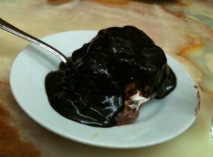 Profiteroles: A flaky crust and drenched (of course!) in chocolate.